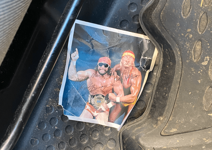 hulk hogan and macho man photo found in a used car.